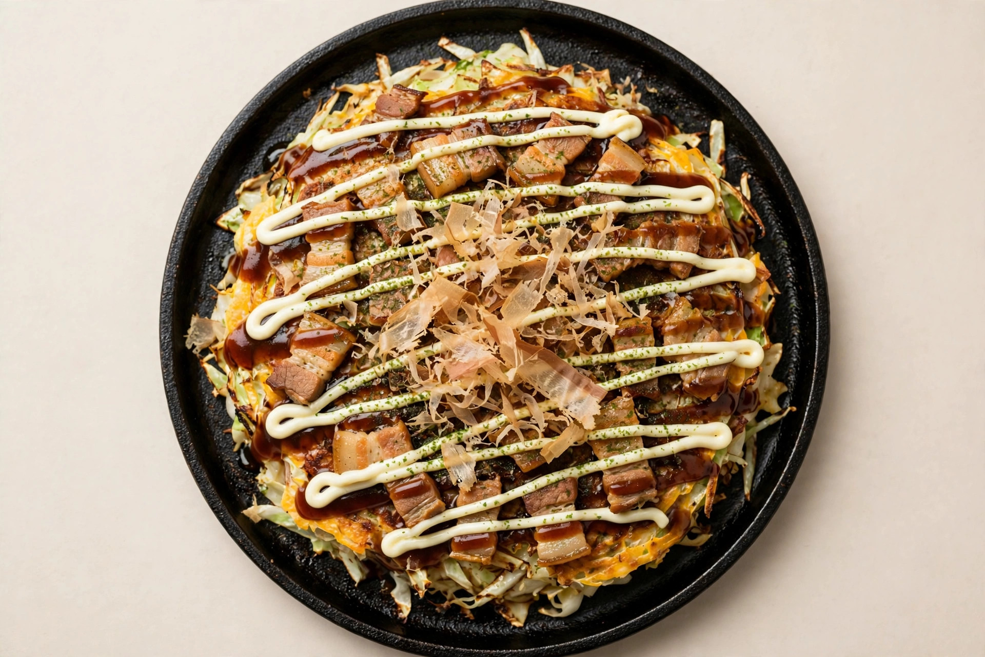 Okonomiyaki — Osaka-style savory pancake with pork